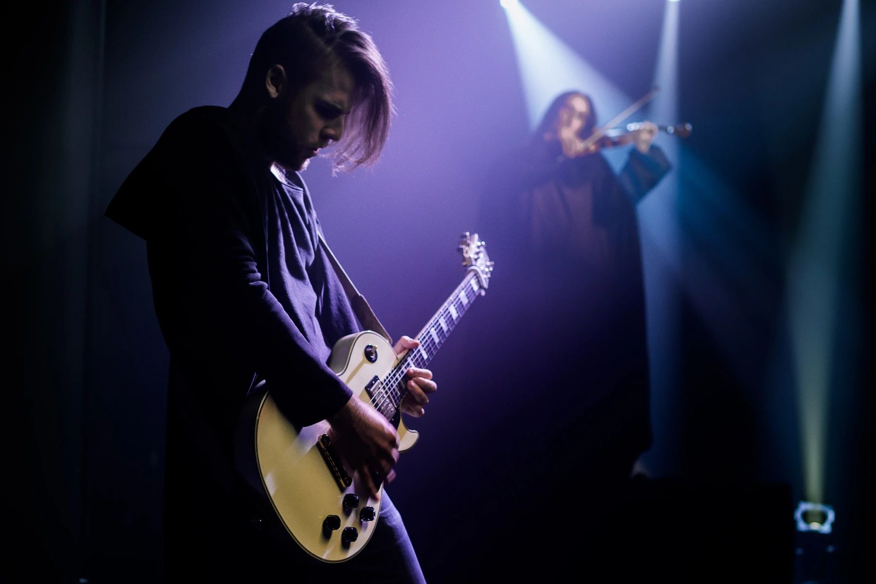 Electric guitar and violin share the stage