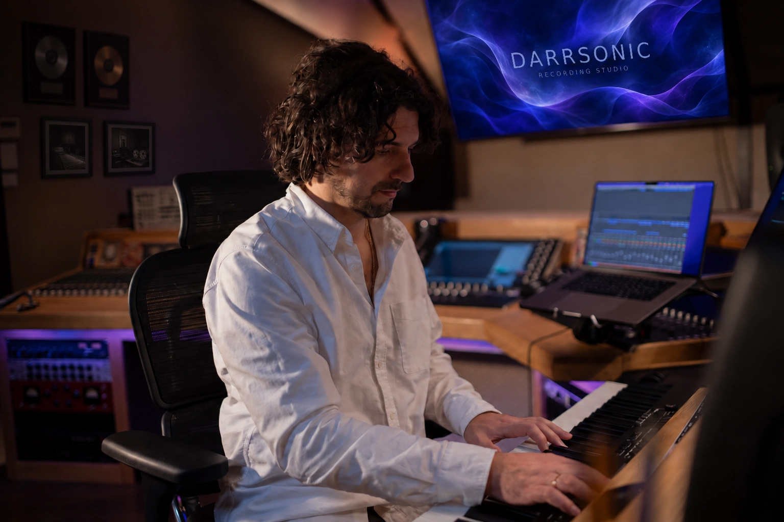 Demitri at the keyboard in DARRSONIC Recording Studio